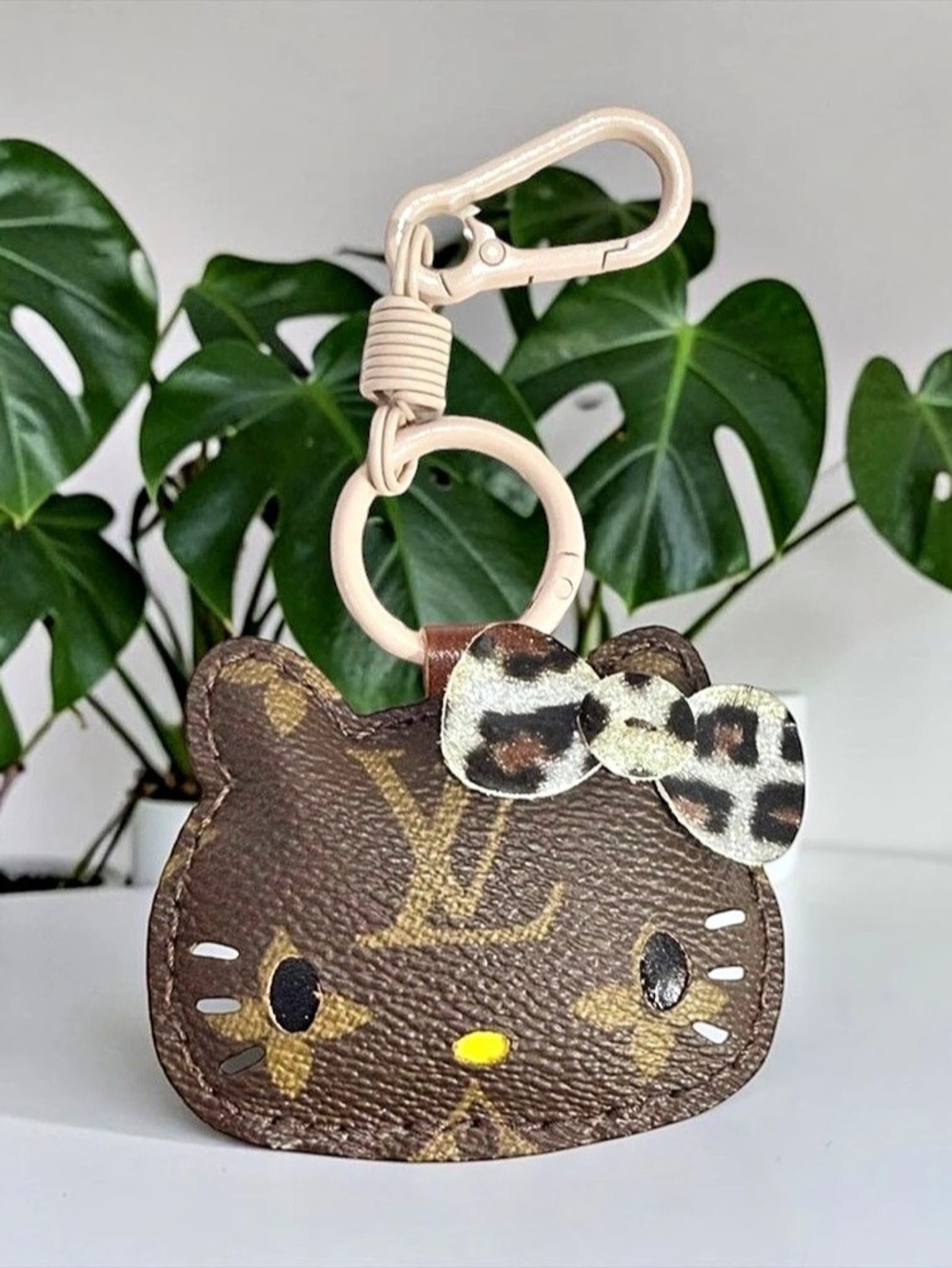 Louis Vuitton Repurposed Canvas into Safari Hello Kitty Holder in Brown & Gold
